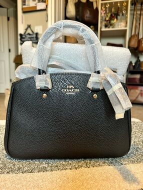 Coach NWT Savannah carryall factory wrapped.